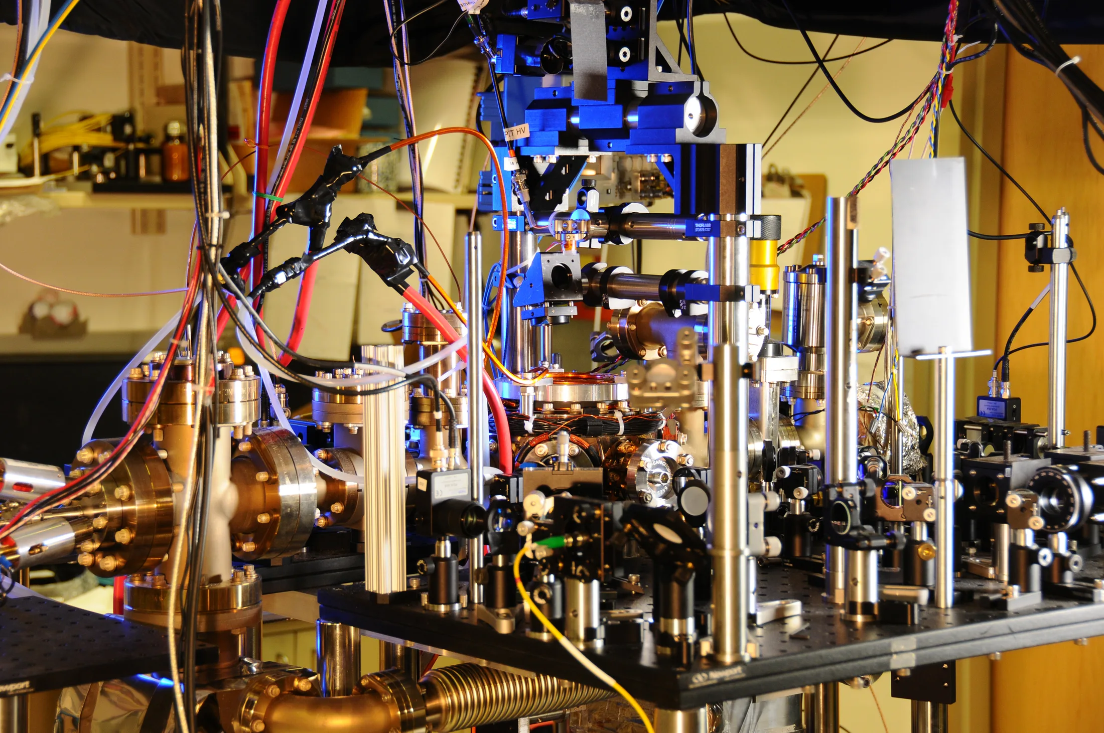 NIST ytterbium lattice atomic clock — laser table, fibers, and vacuum chamber